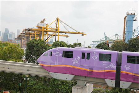 Monorail running on Sentosa Gateway with Brani Terminal at background,Singapore Stock Photo - Rights-Managed, Code: 855-03025338