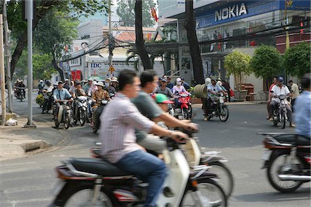 simsearch:855-02987805,k - People on motobike in street of Ho Chi Minh,Vietnam Stock Photo - Rights-Managed, Code: 855-03021894