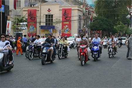 simsearch:855-02987805,k - People on motobike in street of Ho Chi Minh,Vietnam Stock Photo - Rights-Managed, Code: 855-03021924