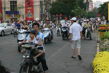 simsearch:855-02987805,k - People on motobike in street of Ho Chi Minh,Vietnam Stock Photo - Rights-Managed, Code: 855-03021925