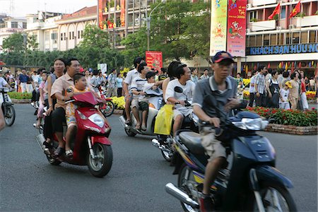 simsearch:855-02987805,k - People on motobike on Le Loi St.,Ho Chi Minh City,Vietnam Stock Photo - Rights-Managed, Code: 855-03021931