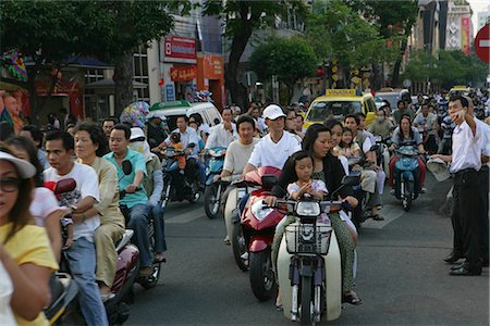 simsearch:855-02987805,k - People on motobike on Le Loi St.,Ho Chi Minh City,Vietnam Stock Photo - Rights-Managed, Code: 855-03021933