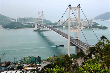 Overlooking Tsing Ma Bridge and Ma Wan from Tsing Yi Island,Hong Kong Stock Photo - Rights-Managed, Code: 855-03023200