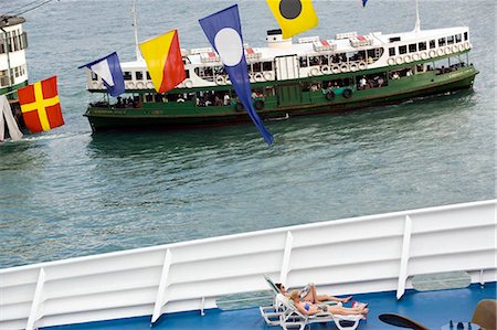 Star ferry passing by the cruise ship,Hong Kong Stock Photo - Rights-Managed, Code: 855-03023935