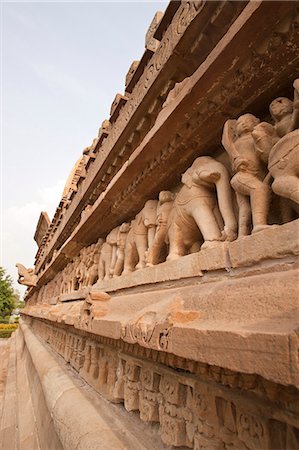 Details of a statues at a temple, Khajuraho, Chhatarpur District, Madhya Pradesh, India Stock Photo - Rights-Managed, Code: 857-06721524