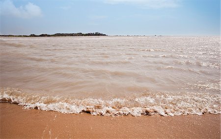 simsearch:6105-07744394,k - Muddy water at Balachadi Beach, Jamnagar, Gujarat, India Stock Photo - Rights-Managed, Code: 857-06721663