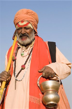 pushkar - Close-up of a sadhu holding a kamandal, Pushkar, Rajasthan, India Stock Photo - Rights-Managed, Code: 857-03192474