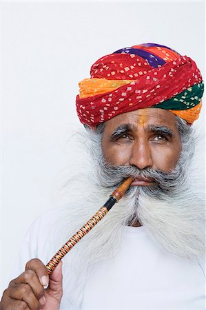 Portrait of a man smoking Stock Photo - Rights-Managed, Code: 857-03192577