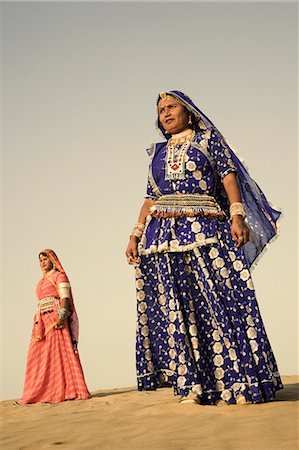 Two women standing in a desert, Thar Desert, Jaisalmer, Rajasthan, India Stock Photo - Rights-Managed, Code: 857-03192636