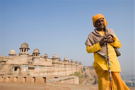 security costume - Sadhu with fort in the background, Gwalior Fort, Gwalior, Madhya Pradesh, India Stock Photo - Rights-Managed, Code: 857-03192693