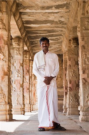 simsearch:862-03711843,k - Man standing in a temple, Krishna Temple, Hampi, Karnataka, India Stock Photo - Rights-Managed, Code: 857-03192756
