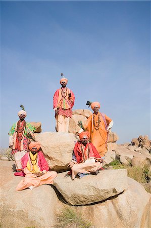 Five sadhus in a boulder, Hampi, Karnataka, India Stock Photo - Rights-Managed, Code: 857-03192784