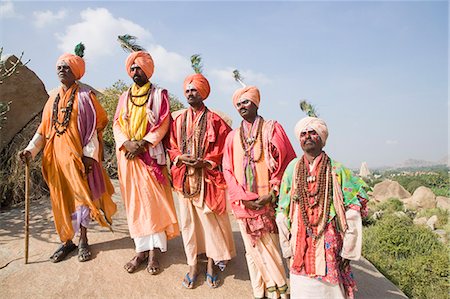 Five sadhus standing on a rock, Hampi, Karnataka, India Stock Photo - Rights-Managed, Code: 857-03192795