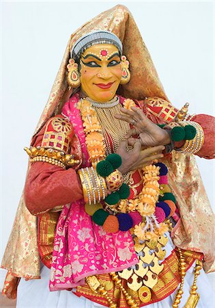 face front man - Close-up of a woman kathakali dancing Foto de stock - Con derechos protegidos, Código: 857-03192864