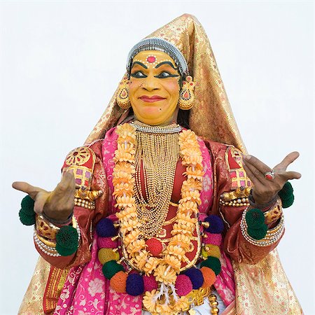 face front man - Close-up of a woman kathakali dancing Foto de stock - Con derechos protegidos, Código: 857-03192865