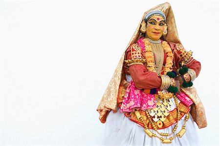 face front man - Close-up of a woman kathakali dancing Foto de stock - Con derechos protegidos, Código: 857-03192863