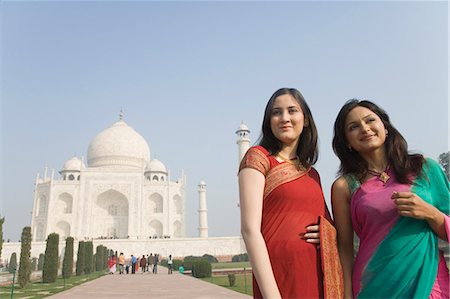 simsearch:857-03193051,k - Two women standing together with a mausoleum in the background, Taj Mahal, Agra, Uttar Pradesh, India Stock Photo - Rights-Managed, Code: 857-03193044