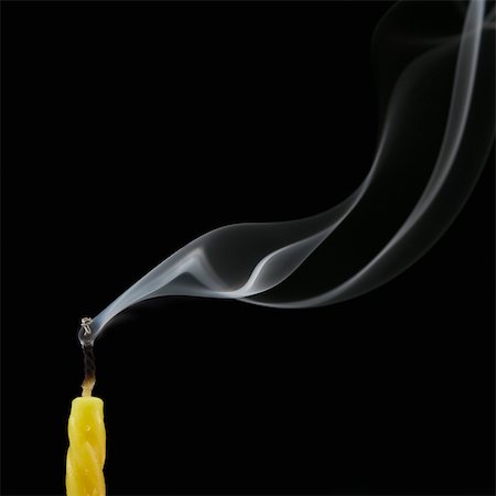 Smoke trailing from extinguished candle Stock Photo - Rights-Managed, Code: 857-03554069