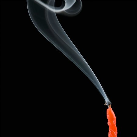 Smoke trailing from extinguished candle Stock Photo - Rights-Managed, Code: 857-03554071