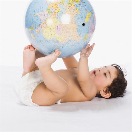 preschooler in diapers - Baby boy playing with a globe Stock Photo - Rights-Managed, Code: 857-03554309