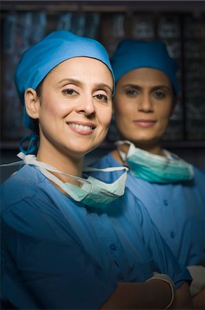 surgical gown - Portrait of two female surgeons smiling, Gurgaon, Haryana, India Stock Photo - Rights-Managed, Code: 857-03554300