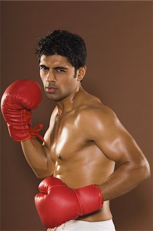simsearch:400-03984387,k - Man practicing boxing Stock Photo - Rights-Managed, Code: 857-03553926