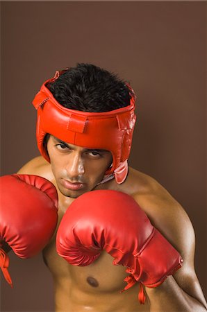 Portrait of a boxer practicing Stock Photo - Rights-Managed, Code: 857-03553927