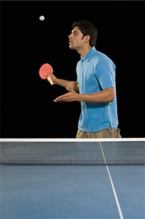 Man playing table tennis Stock Photo - Rights-Managed, Code: 857-03553934