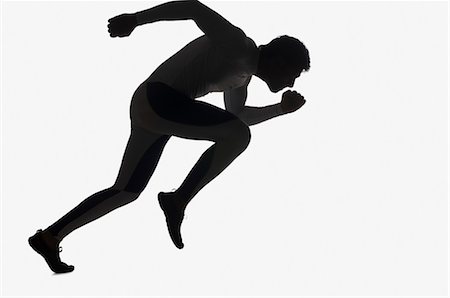 Silhouette of a male athlete running Stock Photo - Rights-Managed, Code: 857-03553932