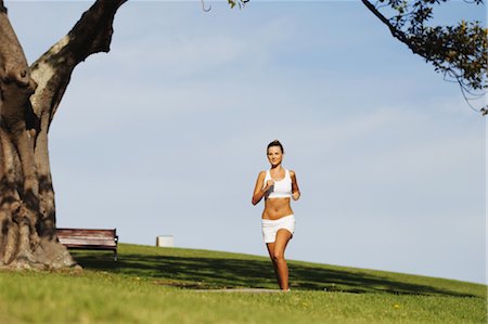 simsearch:633-01715682,k - Young Woman Running Stock Photo - Rights-Managed, Code: 858-05799355