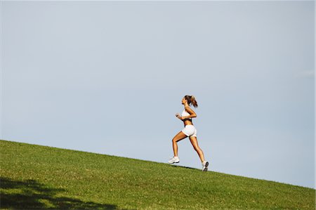simsearch:633-01715682,k - Young Woman Running Stock Photo - Rights-Managed, Code: 858-05799360