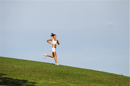 simsearch:633-01715682,k - Young Woman Running Stock Photo - Rights-Managed, Code: 858-05799361