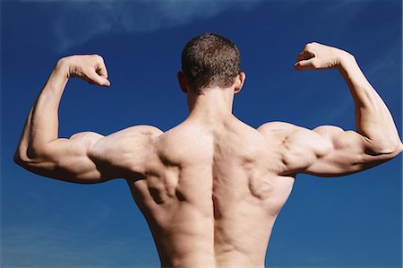 spinal cord of a male - Man Showing Muscles Stock Photo - Rights-Managed, Code: 858-06617629