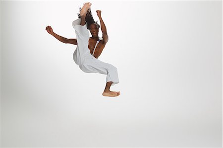 Man Practicing Capoeira Stock Photo - Rights-Managed, Code: 858-06617796