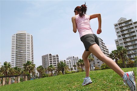 Woman Jogging In A Park Stock Photo - Rights-Managed, Code: 858-06756076
