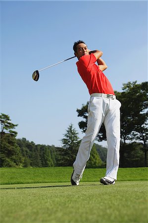 simsearch:858-05799196,k - Golfer Swinging Club Stock Photo - Rights-Managed, Code: 858-06756155