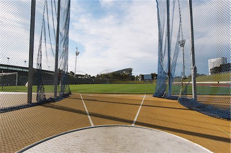 simsearch:858-06756224,k - Athletic Field Throwing Cage Stock Photo - Rights-Managed, Code: 858-06756247