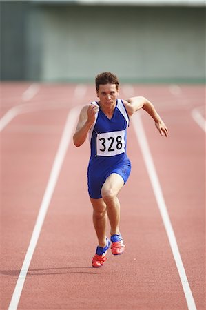 fast action - Runner On Track Stock Photo - Rights-Managed, Code: 858-06756367