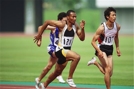 simsearch:832-02254835,k - Track Athletes Sprinting Stock Photo - Rights-Managed, Code: 858-06756370