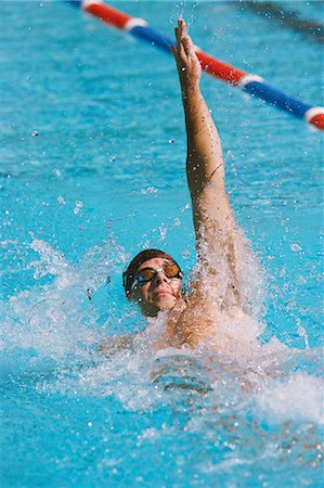 simsearch:858-06756400,k - Male Swimmer Doing Backstroke Stock Photo - Rights-Managed, Code: 858-06756386