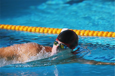 simsearch:858-06756400,k - Swimmer Swimming In Pool Stock Photo - Rights-Managed, Code: 858-06756404