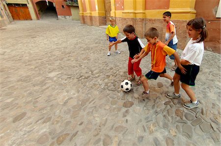 Kids Playing Street Soccer Stock Photo - Rights-Managed, Code: 858-03046614