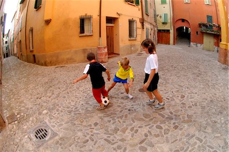 Kids Playing Street Soccer Stock Photo - Rights-Managed, Code: 858-03046615