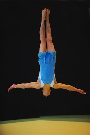 Young gymnast doing floor exercise Stock Photo - Rights-Managed, Code: 858-03047721