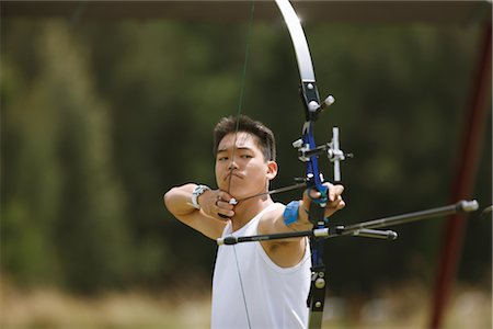 Archer Aiming Stock Photo - Rights-Managed, Code: 858-03048980