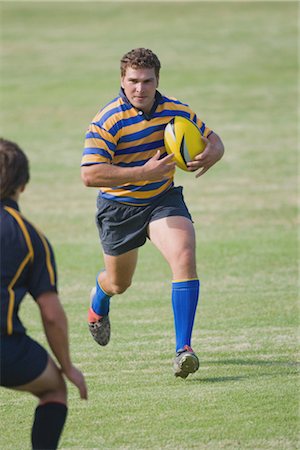 rugby players - Rugby player running with rugby ball Stock Photo - Rights-Managed, Code: 858-03049270
