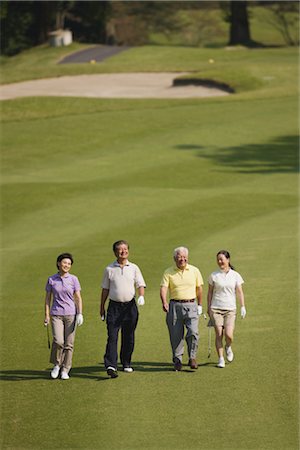 simsearch:858-03050428,k - Japanese golfers walking together Stock Photo - Rights-Managed, Code: 858-03049289