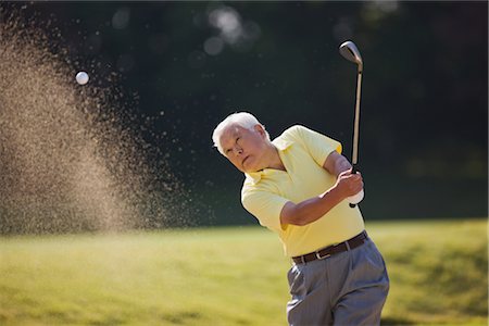 Man playing golf in golf course Stock Photo - Rights-Managed, Code: 858-03049309