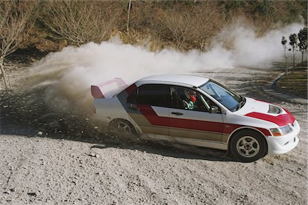dusty environment - Rally car and clouds of dust Stock Photo - Rights-Managed, Code: 858-03049374
