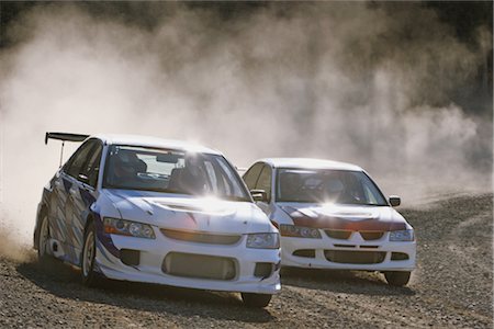 dusty environment - Two cars competing in rally Stock Photo - Rights-Managed, Code: 858-03049376